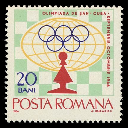 Globe, olympic rings & pawn in front of chessboard