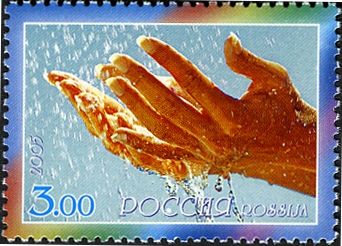 Hands in Dripping Water
