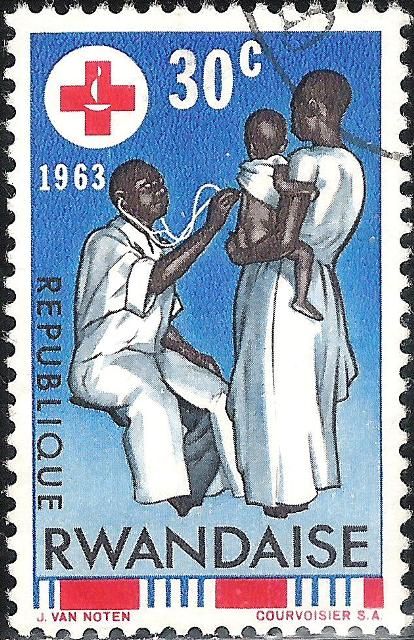 Physician examining infant