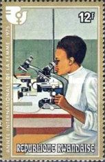 Scientist with microscope