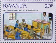 Teacher seated at desk