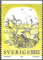 Rabbits Running through Grass