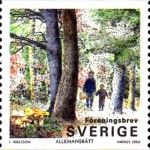 Parent and Child walking through forest
