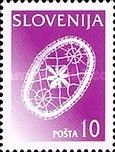 Oval with flower in centre