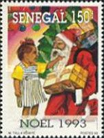 Girl Tugging Father Christmas's Beard