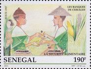Men Handling Grain Seeds – Grain Banks