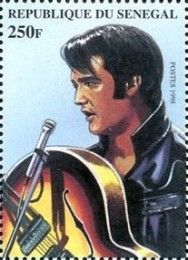 Elvis in Profile with Guitar