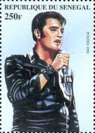 Elvis in Three-quarter View  Singing to Handheld Microphone
