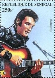 Elvis Singing with Guitar in Closeup