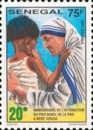 Mother Teresa Pinches Child's Cheek