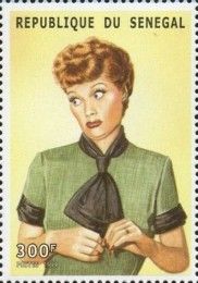 In Green Shirt Glancing Sideways