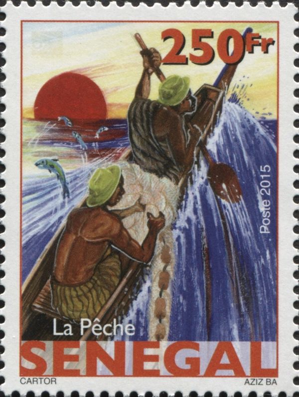 Dropping nets into the water from canoe