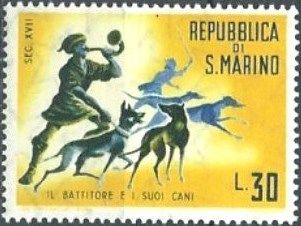 Hunter with horn and dogs