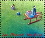 Man, sleigh and gifts