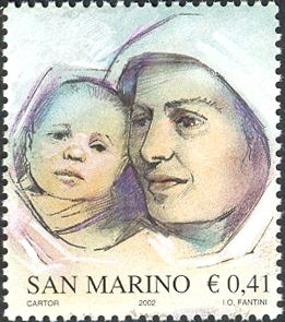 Baby and mother in blanket