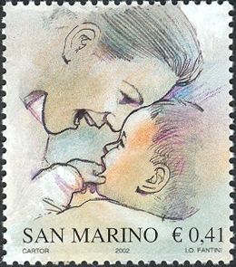 Mother showing open mouth to baby