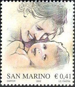 Mother smiling at baby