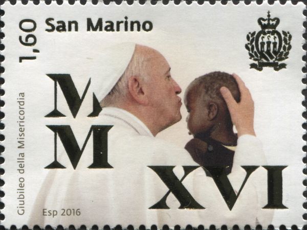 Pope kisses a sick child in Kenya