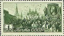 People Celebrating May Day on Red Square & Stalin Banner