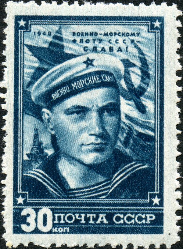 Sailor and USSR Navy Flag