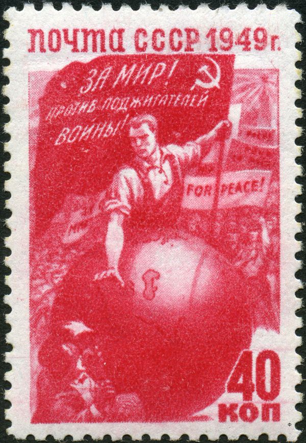 Worker and Globe with Peace Banner
