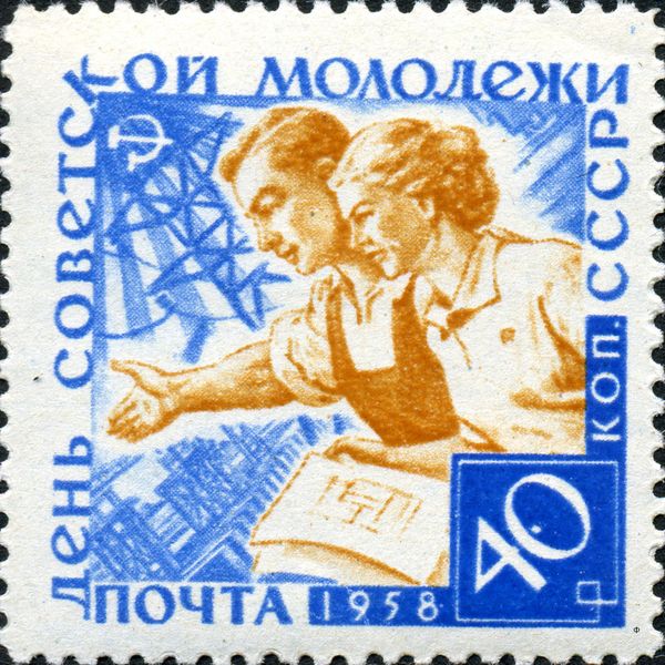 Young Couple in Front of Power Plant