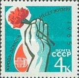 Blood Donor Badge and Hand with Flower