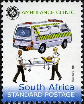 Ambulance, attendants moving patient on gurney