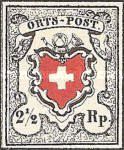 Coat of arms below post horn with cross edging