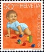 Young Child Playing with Building Blocks