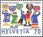 Children of 5 Continents Holding High Painted Hearts