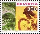 Cycling: Stone bridge at Biasca & mountain biker