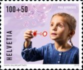 Child Blowing Bubbles