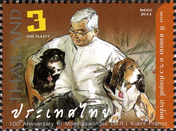 M. R. Kukrit Pramoj (1911-1995) with his dogs