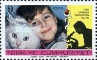 Girl with Angora Cat (Felis silvestris catus)