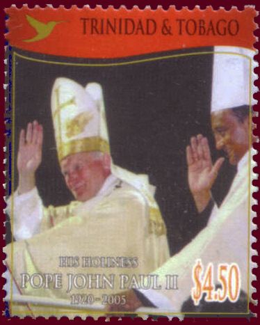 With Archbishop Pantin, Hands Raised in Blessing