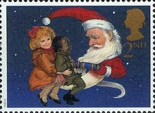 Children and Father Christmas pulling Crackers