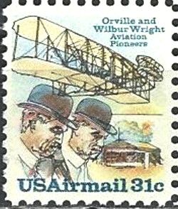 "Wright Flyer I" and Wright Brothers (in bowler hats)