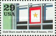 Banner in window (Gold Stars mark World War II losses)