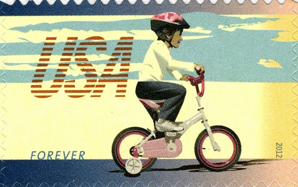 Child on Bicycle with Training Wheels