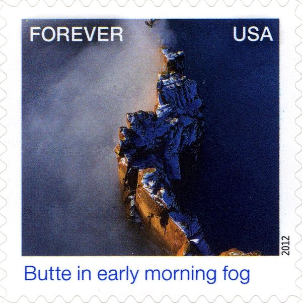 Earthscapes: Butte in morning fog