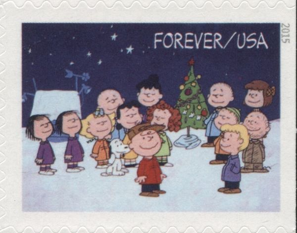 Children singing around the tree