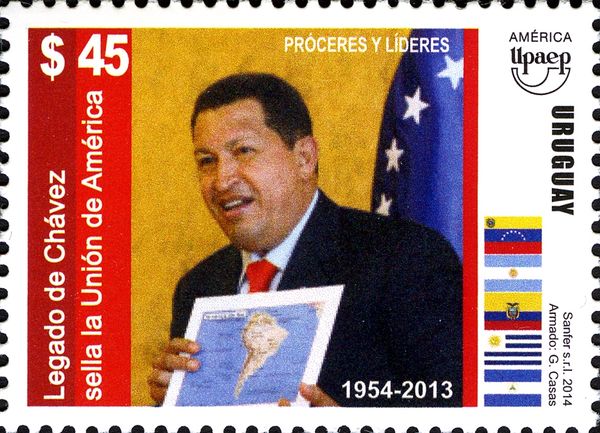 Hugo Chávez (1954-2013) holding Map