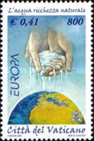 Hand Pouring Water on the World