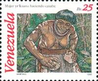 Ye'kuana woman using stones to do laundry