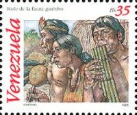 Guahibo people, one playing flute