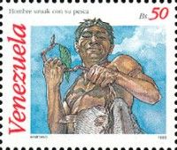 Uruak man with caught fish