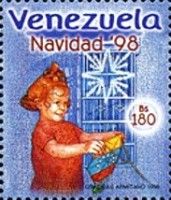 Girl standing in front of windows with a kite