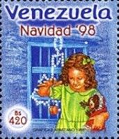 Girl standing in front of windows with yo-yo anddolly