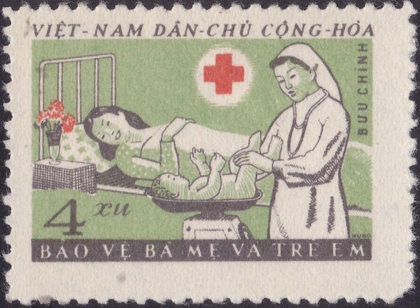 Nurse Weighing Baby